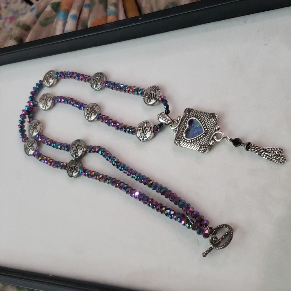 Arora Borealis Crystals with Heart pendant withFleur-de-lis beads.